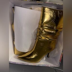 Women's gold Jeffrey Campbell Slouch Boots
Brand NEW